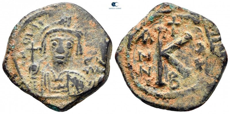 Maurice Tiberius AD 582-602. Constantinople
Half Follis or 20 Nummi Æ

25 mm,...