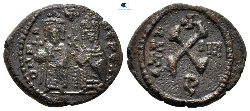 Phocas, with Leontia AD 602-610. Theoupolis (Antioch)
Decanummium Æ

17 mm, 2...