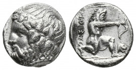 Greek
Islands off Thrace. Thasos circa 411-340 BC.
Drachm AR
Head of Dionysos to left, wearing wreath of ivy / ΘAΣION, Herakles, wearing lion skin, kn...