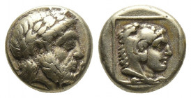 Greek
Lesbos, Mytilene EL Hekte. Circa 375-326 BC. Laureate head of Zeus right / Head of Herakles right, wearing lion skin, within linear square frame...