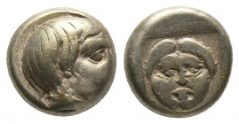 Greek
Lesbos, Mytilene EL Hekte. Circa 454-428/7 BC. Head of Aktaion right / Facing gorgoneion within incuse square. 
Weight: 2.5 g Diameter: 10 mm