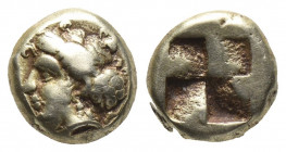 Greek
Ionia, Phokaia EL Hekte. Circa 478-387 BC. Young female head left, hair bound with band; below, inverted seal to left / Irregular quadripartite ...