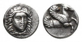 Greek
Cilicia. Uncertain mint 470-400 BC.Hemiobol AR Draped bust of Apollo facing slightly right / Forepart of Pegasos right.
 Weight: 0.37 g Diameter...