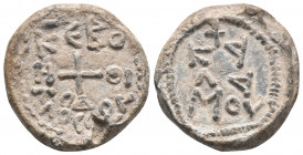 BYZANTINE LEAD SEAL (8th-9th CENTURY)
Obverse: Cross in the middle, schematic writing around it. Pearl border.
Back: 3 lines of shortened text startin...