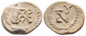 Byzantine Lead Seal Patriarch (7th Century)
Obverse: Block monogram. The monogram is built on the letter n. It stands for PATRIKIOS. A wreath is a bor...