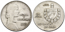 Cuba. 1 peso. 1939. (Km-22). Ag. 26,69 g. Almost XF. Est...50,00. 


 SPANISH DESRCIPTION: Cuba. 1 peso. 1939. (Km-22). Ag. 26,69 g. EBC-. Est...50...