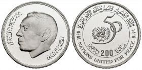 Morocoo. Hassan II. 200 dirhams. 1416 H (1995). (Km-Y102). Ag. 14,79 g. 50th Anniversary of United Nations. PR. Est...30,00. 


 SPANISH DESRCIPTIO...