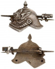 Germany Badge (1918). Helmet pierced with a bayonet. On the other side there is a clasp and a brand of the master (FROSE). Bronze silbered. With certi...