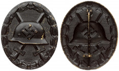 Germany Wound Badge in black(1939). Wound badge for the army 1939 in black; central depiction of a steel helmet with a swastika on crossed swords surr...