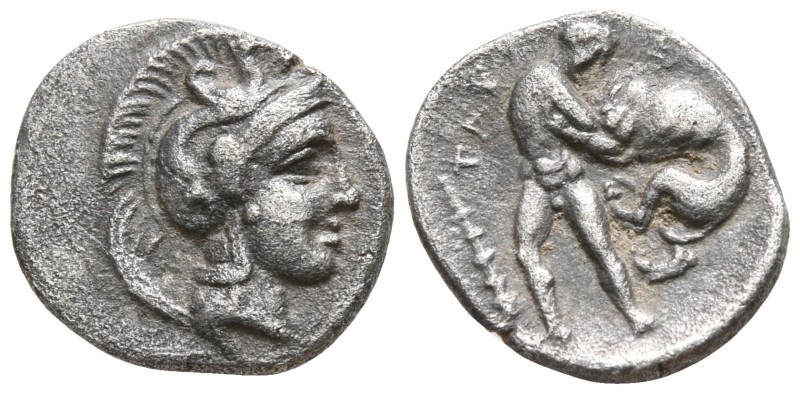Calabria. Tarentum circa 380-344 BC.
Diobol AR

11mm., 1,15g.

Helmeted hea...