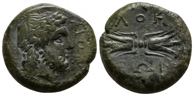 Bruttium. Lokroi Epizephyrioi 300-268 BC.
Bronze Æ

19mm., 10,18g.

Laureat...