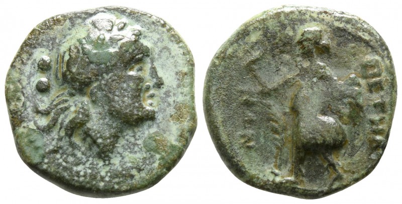 Bruttium. Petelia circa 215-210 BC.
Sextans Æ

13mm., 2,10g.

Laureate head...