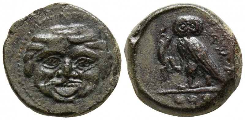 Sicily. Kamarina circa 420-405 BC.
Tetras Æ

15mm., 3,43g.

Gorgoneion / Ow...