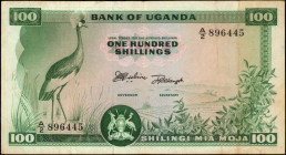 UGANDA. Bank of Uganda. 100 Shillings, 1966. P-4a. Fine.

Scarce type without text "For Bank of Uganda" below denomination. An ink spot is found on ...