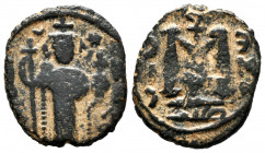 Other Islamic coins. Mu'awiya I ibn Abi Sufyan. Fals. 41-60 H. Hims (Emesa). Arab-Byzantine, Umayyad Caliphate. (Album-3516). (Walker-28-31). Ae. 3,45...