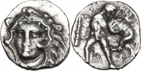 Greek Italy. Southern Apulia, Tarentum. AR Diobol, 325-280 BC. Obv. Head of Herakles facing slightly left, wearing lion's skin. Rev. Herakles standing...