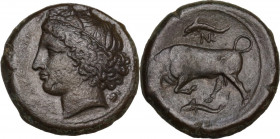 Sicily. Syracuse. Agathokles (317-289 BC). AE 22 mm, c. 317-310 BC. Obv. Head of Kore left, wearing wreath of grain. Rev. Bull butting left; above and...
