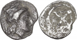 Greek Asia. Uncertain mint. AR Tetartemorion, c. 4th century BC. Obv. Head of Apollo(?) right. Rev. X within circle. AR. 0.20 g. 7.00 mm. VF.