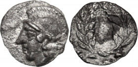 Greek Asia. Aeolis, Elaia. AR Hemiobol, 450-400 BC. Obv. Head of Athena left, helmeted. Rev. Wreath. SNG Cop. 164. AR. 0.34 g. 8.00 mm. Lightly toned....
