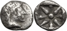Greek Asia. Ionia, uncertain mint. AR Hemiobol, 500-400 BC. Obv. Head right. Rev. Star with eight rays, all within incuse square. cf. Savoca, 7th blue...