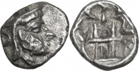 Greek Asia. Persis. Uncertain king (2nd cent. AD). AR Obol. Obv. Head right with short beard, wearing diadem and kyrbasia surmounted by eagle. Rev. Fi...