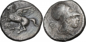 Continental Greece. Corinthia, Corinth. AR Stater, c. 405-345 BC. D/ Pegasos flying left; [below, koppa]. R/ Helmeted head of Athena right; behind, iv...