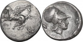 Continental Greece. Corinthia, Corinth. AR Stater, c. 400-375 BC. D/ Pegasos flying left; below, koppa. R/ Helmeted head of Athena right; behind, scor...