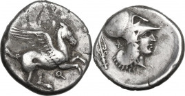Continental Greece. Corinthia, Corinth. AR Stater, c. 405-345 BC. D/ Pegasos flying right; below, koppa. R/ Helmeted head of Athena right; behind, tri...