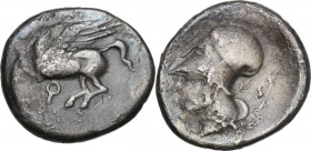 Continental Greece. Corinthia, Corinth. AR Stater, 375-300 BC. D/ Pegasos flying left; below, koppa. R/ Helmeted head of Athena left; behind, E and bo...