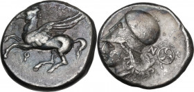 Continental Greece. Corinthia, Corinth. AR Stater, c. 345-307 BC. D/ Pegasos flying left; below, koppa. R/ Helmeted head of Athena left; behind, N and...