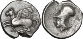 Continental Greece. Akarnania, Leukas. AR Stater, c. 375-350 BC. D/ Pegasos flying left; below, Λ; behind, E. R/ Helmeted head of Athena left; before,...