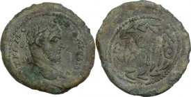 Macrinus (217-218). AE 26 mm. Antioch (Seleucis and Pieria)(?). Obv. Laureate bust right. Rev. SC; above, Ε; below, Δ. Cf. McAlee 734 and Sear 2949. A...