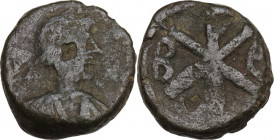 Justin I (518-527). AE Pentanummum. Constantinople mint. Obv. Diademed, draped and cuirassed bust right. Rev. Large Christogram; to left, B; to right,...