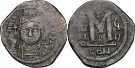 Maurice Tiberius (582-602). AE Follis. Constantinople mint, 2nd officina. Dated RY 8 (589/90). Obv. Helmeted and cuirassed bust facing, holding globus...