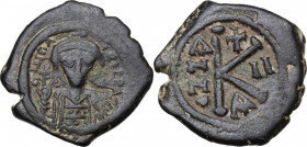Maurice Tiberius (582-602). AE Half Follis. Constantinople mint, officina A. Dated RY 2. Obv. Bust facing, wearing crown and loros, and holding globus...
