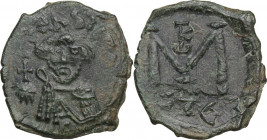 Constans II (641-668). AE Follis, Syracuse mint, 647-652. Obv. Bust facing, crowned, draped, holding globus cruciger. Rev. Large M (mark of value). MI...
