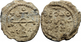 Theodoros. Lead Seal, 7th-8th century. Obv. Cruciform invocative monogram: Θεότοκε βοήθει; in the quarters: τῷ δούλῳ σοῦ. Rev. Inscription in four lin...