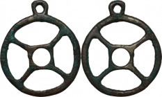 Bronze wheel pendant. Diameter with original loop 41 mm. Bronze Age c. 1500 BC.