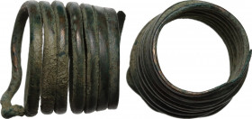 Bronze spiral ring. Inner diameter 15 mm, height 18 mm. Hallstatt period 1200-1000 BC.