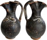Gnathia-Ware Oinochoe. The body decorated with ivy tendrils motif. Apulia, 4th century BC. Height 19 cm. NO EXTRA-EU EXPORT.