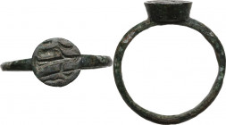 Bronze ring, bezel engraved with standing god holding scepter. Inner diameter 21 mm. Roman Period, 1st-3rd century.