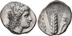 LUCANIA. Metapontion. Circa 330-290 BC. Didrachm or Nomos (Silver, 24 mm, 7.69 g, 1 h). Head of Demeter to right, wearing wreath of grain ears, triple...