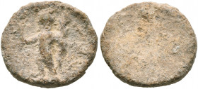 ASIA MINOR. Uncertain. 2nd-3rd centuries. Tessera (Lead, 14 mm, 2.58 g). Victorious athlete (?) standing left, holding wreath in his right hand and pa...