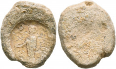 ASIA MINOR. Uncertain. 2nd-3rd centuries. Tessera (Lead, 15 mm, 2.45 g). ...O... Togate figure standing front, head to left, holding scroll (?) in his...