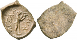 ASIA MINOR. Uncertain. 2nd-3rd centuries. Tessera (Lead, 16 mm, 2.80 g), Claudius Attalus. ΚΛΑ - ATTAΛ Aulos player standing to right, with the head o...