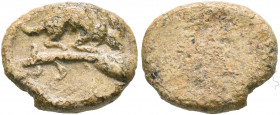 ASIA MINOR. Uncertain. 2nd-3rd centuries. Tessera (Lead, 11 mm, 1.41 g). Hare (?) standing right on uncertain object. Rev. Blank. Apparently unpublish...