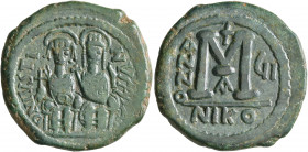 Justin II, with Sophia, 565-578. Follis (Bronze, 30 mm, 13.47 g, 6 h), Nicomedia, RY 6 = 571/2. D N IVSTINVS P P AVG Justin II, holding globus crucige...