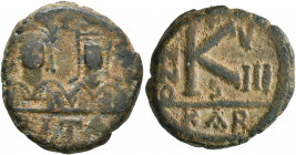 Justin II, with Sophia, 565-578. Half Follis (Bronze, 22 mm, 9.37 g, 10 h), Carthage, RY 8 = 572/3. Facing busts of Justin II, on the left, helmeted a...
