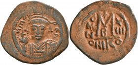 Maurice Tiberius, 582-602. Follis (Bronze, 32 mm, 10.75 g, 7 h), Nicomedia, RY 13 = AD 594/5. D N mAVRI PЄ P P Helmeted and cuirassed bust of Maurice ...