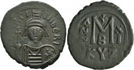 Maurice Tiberius, 582-602. Follis (Bronze, 31 mm, 12.39 g, 6 h), Cyzicus, RY 11 = AD 592/3. o N mA૪RCI TibЄRI Helmeted and cuirassed bust of Maurice T...